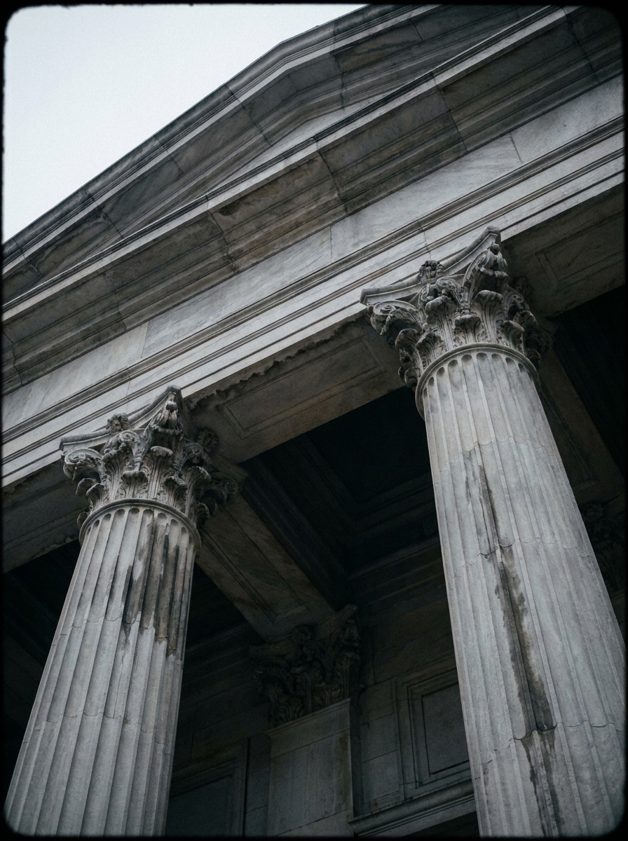 Corinthian capitals carrying the pediment of an old exchange building.